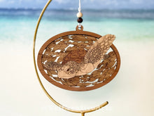 Load image into Gallery viewer, Green sea turtle wooden layered ornament, handcrafted with mahogany, maple, and sapele veneers, 5.5" wide by 4.4" tall, made in Virginia, USA, @BelCreativeArts