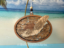 Load image into Gallery viewer, Green sea turtle wooden layered ornament, handcrafted with mahogany, maple, and sapele veneers, 5.5" wide by 4.4" tall, made in Virginia, USA, @BelCreativeArts