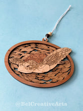 Load image into Gallery viewer, Green sea turtle wooden layered ornament, handcrafted with mahogany, maple, and sapele veneers, 5.5" wide by 4.4" tall, made in Virginia, USA, @BelCreativeArts