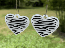 Load image into Gallery viewer, Zebra stripe heart earrings, white, dangle style, made in USA