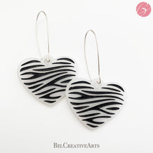 Load image into Gallery viewer, Zebra stripe heart earrings, white, dangle style, made in USA

