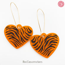 Load image into Gallery viewer, Tiger stripe heart earrings, orange, dangle style, made in USA
