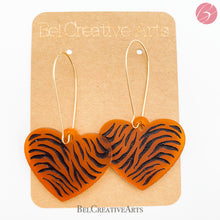 Load image into Gallery viewer, Tiger stripe heart earrings, orange, dangle style, made in USA
