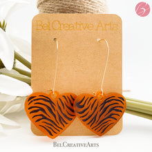 Load image into Gallery viewer, Tiger stripe heart earrings, orange, dangle style, made in USA
