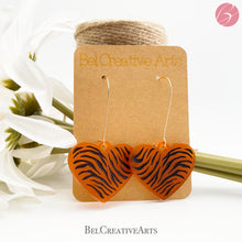Load image into Gallery viewer, Tiger stripe heart earrings, orange, dangle style, made in USA

